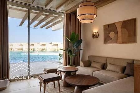 صف اول لاجون + sea view  شاليه ارضي بجاردن للبيع في ديركشن وايت  راس الحكمة ، الساحل الشمالي  بعد مدينة العلمين  مراسي  و غزاله باي  قبل سيدي حنيش