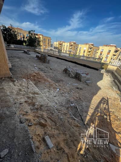 A very distinctive  apartment with garden  for sale in Al Khamael Compound, prime location.