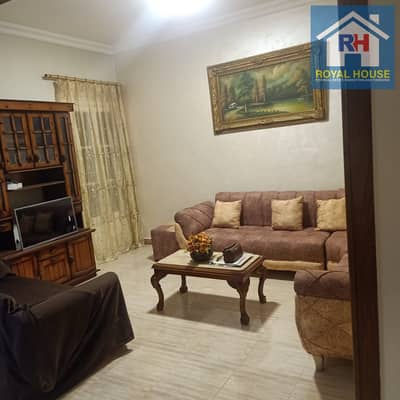 85m² apartment in Heliopolis, prime location near Khalifa Al-Ma'moun Street, second floor, distinctive facade, ready for immediate occupancy.