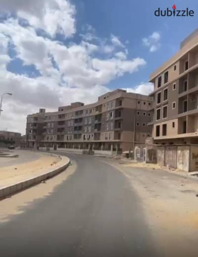 شقه بدون تطشيب بسعر مميز مقدم و اقساط استلام فورى كمبوند M-Apartments _ التوسعات الشماليه 6 اكتوبر
