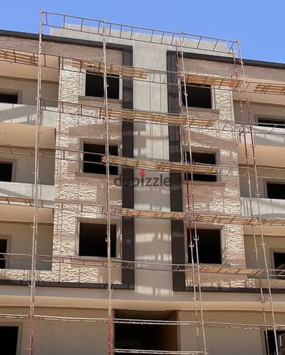 200 m apartment letter C immediate receipt - second number from the Boulevard axis in the most upscale compounds Mountain View and Sodic semi-finishing - with meters near Mall of Arabia facilitation for 18 months