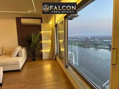 Hotel studio apartment with a high return of up to 5 million, on the Nile, first row in Maadi, immediate occupancy, finished with air conditioning and
