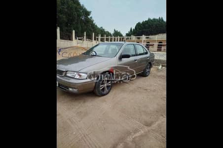 نيسان صنى 2000 مستوردة مستعملة للبيع حدائق الاهرام