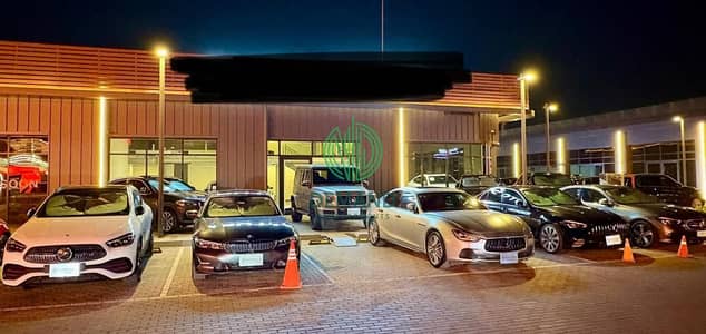 Car showroom 320 sqm fully finished with Ac's for rent in directly on al wahat road in 6 October