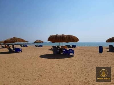 Duplex for sale, fully furnished and equipped, finished, available in a fully serviced village, Aquarius Village, Ain Sokhna. Immediate occupancy.