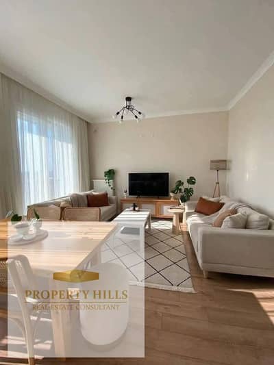 Sur Basur, near City Centre Almaza, I'm selling a great deal on a fully finished apartment with air conditioning and a kitchen in Sheraton.