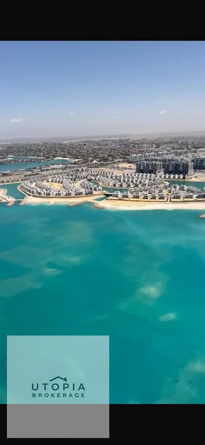 شاليه فاخر للبيع في العلمين الجديدة | 182 متر | الدور 34 | إطلالة مباشرة على اللاجون والبحر | تشطيب كامل بالتكييفات
