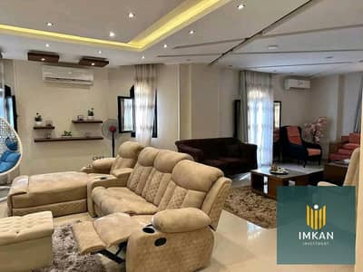 Minutes from Gate 13 of Al Rehab, an apartment for sale, ready for immediate occupancy, fully finished, on Mohamed Naguib Axis with a stunning view of
