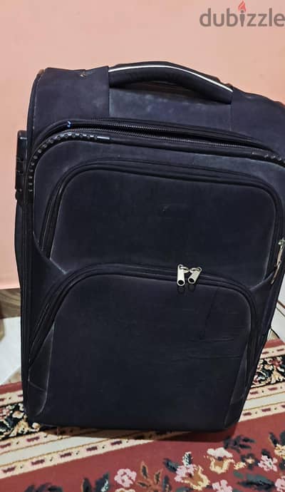 شنطة سفر . صغيره
