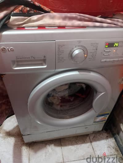 غسالة أوتوماتيك lg 7كيلو تقفيل كوري اصل لونها  سيلفر
