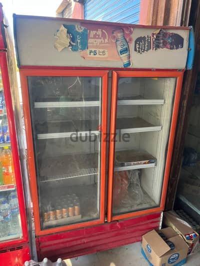 تلاجة عرض اتنين باب كبيره حاله ممتازه وماتور دانفوس