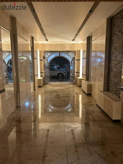 Apartment for sale on the Nile Corniche in Al-Munira, Giza, Al-Bahr Al-Azam Street, in front of Al-Hamam Casino, next to Tzipas, 230 square meters, third floor, elevator, 3 rooms, 2 large bathrooms, a large reception, and a large kitchen.