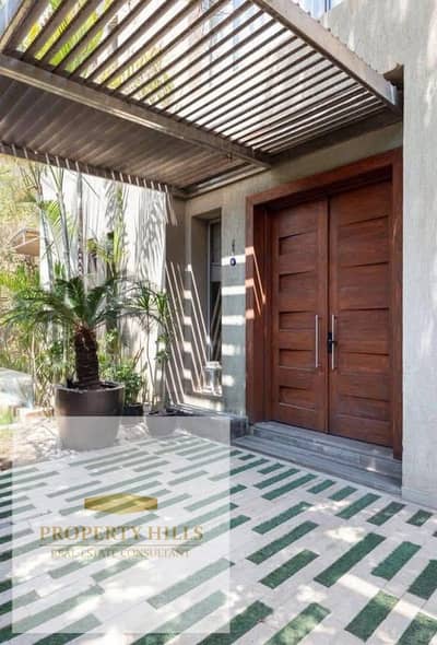 Villa for sale, furnished with air conditioning, at half price next to the American University, with payment facilities available and a 40% cash discount.
