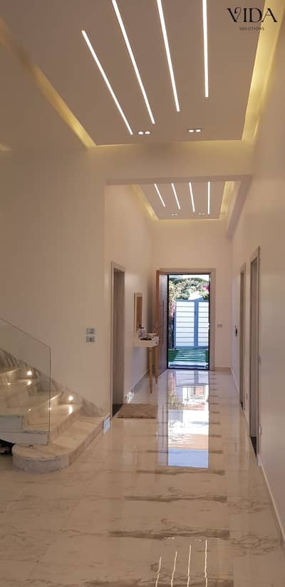 Luxury 600 sqm fully finished twin house for sale in Zayed Dunes, Sheikh Zayed, featuring 8 bedrooms, 6 bathrooms, 330 sqm garden and 100 sqm roof.