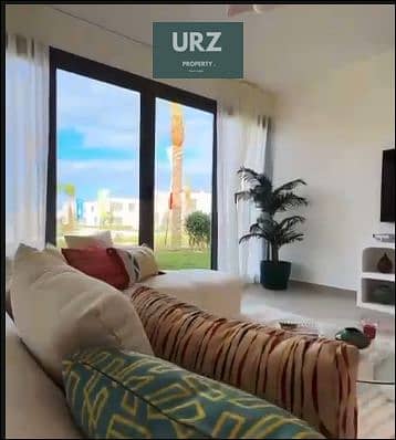 شالية كورنر open view علي الاجون بسعر مميز و بالتقسيط المريح علي 10 سنين في راس الحكمة الساحل الشمالي بالقرب من ساوث ميد و سي شور مارباي  للبيع