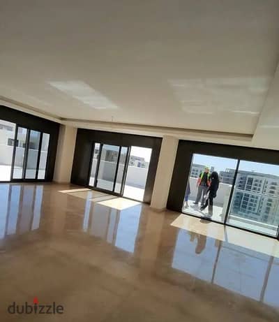 Luxury apartment for sale with hotel finishing in ZZ Towers by Ora in the heart of Sheikh Zayed next to Al Rabwa with the longest payment period
