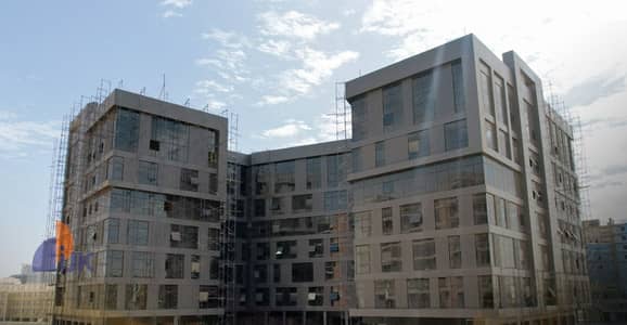 Administrative office for sale, immediate occupancy, in the New Administrative Capital. Prime location, first row on Al Amal Axis and first corner on