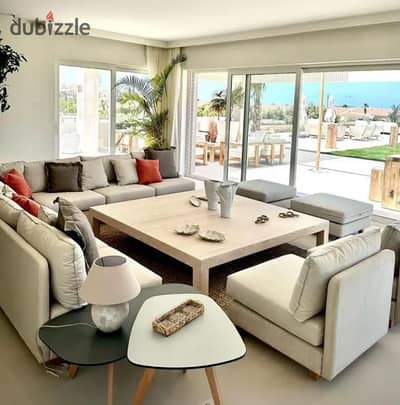Chalet in a strategic location inside Ghazala Bay, fully finished with air conditioners, sea view, for sale in the North Coast.