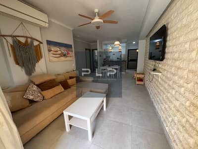 Receive a ground-floor chalet with a garden, ultra-super-luxurious finishing, fully air-conditioned and furnished, with a stunning sea view in Stella