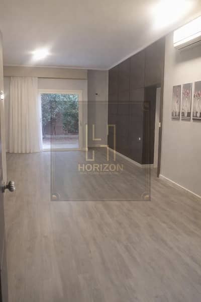 اقل سعر ستوديوبحديقه  نص مفروش للبيع في كمبوند ذا فيلدج بالم هيلز التجمع الخامس Studio sale The Village Palm Hills