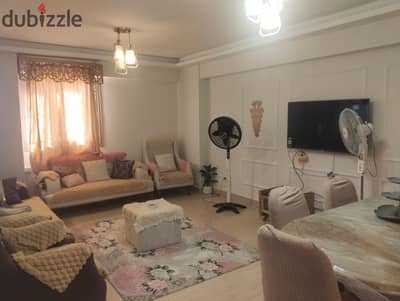 Furnished apartment for annual rent for a family, groom, or company with 3 bedrooms, 6 beds, a two-piece reception, kitchen, 2 bathrooms, on the ninth floor, upper level. All facilities available: water, electricity, natural gas, 2 elevators inside a secure compound with 24-hour security. There are swimming pools and a private garden with a private garage in Alexandria.