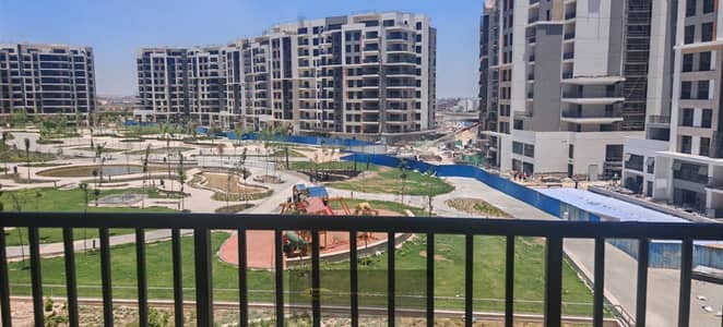 Apartment for rent in ZED West Towers – Sheikh Zayed, first residence, semi-furnished (kitchen + air conditioning), suitable for investment