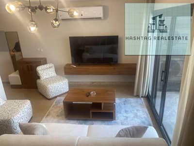 For rent, a hotel apartment, first tenant in Zed West Compound, Sheikh Zayed, 2 bedrooms and 2 bathrooms, fully furnished, air-conditioned, and fully equipped, open view