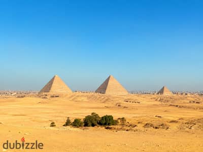 Luxury Furnished Apartment with Direct Pyramids View for Annual Rent in Pyramids Heights Compound  with open view terrace