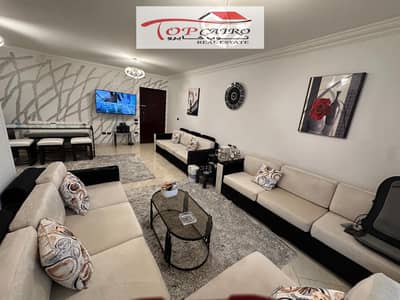 **Luxury Furnished Apartment for Rent – B7**  **Area:** 96 sqm  Direct north-facing view overlooking a huge Wide Garden and the Champs-Élysées Bouleva