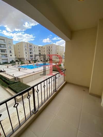 Pool Overlooking Apartment with Special Location At Mivida Boulevard