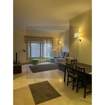 اقل سعرستوديو مفروش للبيع  في كمبوند ذا فيلدج بالم هيلز التجمع  studio sale the village Palm Hills New Cairo