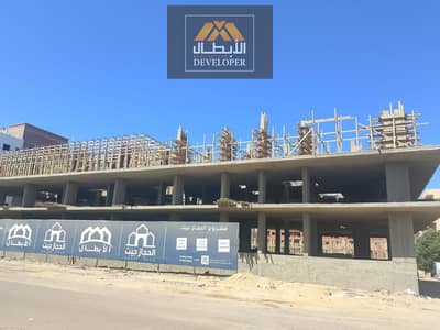63 m² apartment for sale, pool view, Al Hejaz Main Street, green contract, installments up to 36 months, 20% cash discount.