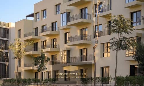 Apartment for immediate delivery with Orascom in Owest Compound, finished, 4 bedrooms with landscape view
