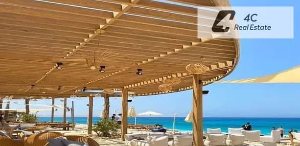 باقل مقدم استلم  تاون هاوس ميدل متشطب بالكامل Full Sea View فوري ريسيل Seashore North Coast الساحل الشمالي بمقدم و تكمله اقساط بدون اي فوايد