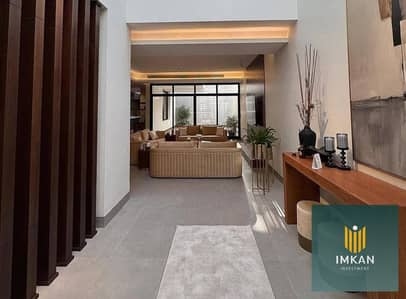 Apartment for sale in Mayan, minutes from Al Rehab, with a down payment of only 900,000 and installments over 10 years, in a prime location in New Cai