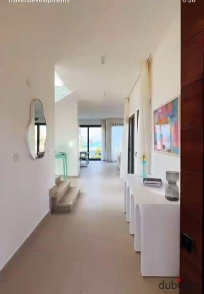 Fully finished chalet  with lagoon view  for sale in Cali Coast, Ras El Hekma at kilo  193 before direction white