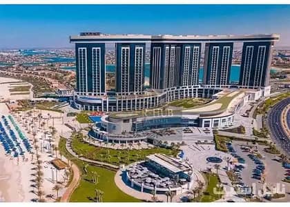 Chalet for sale in Alamein Towers    Sea and lagoon view    Delivery next September    22nd floor    115 sq m    Reception, 2 bedrooms, 2 bathrooms
