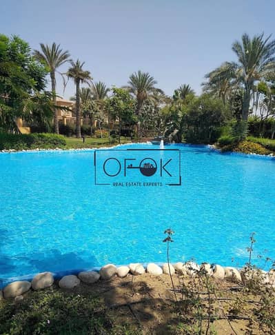 Unique Stand Alone villa For Sale in Gardenia Springs Compound  5th settlement New Cairo. Prime Location Overlooking lagoon and Landscapes