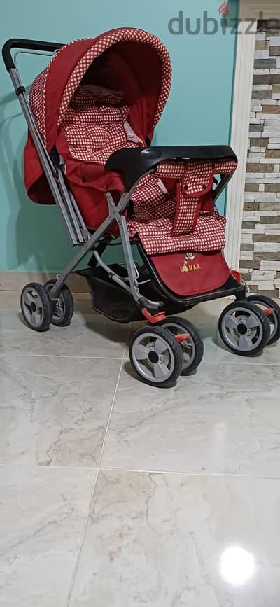 عربة اطفال بحالة ممتازة