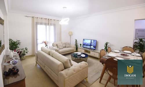 Apartment for sale in Fustat with a 600,000 down payment, fully finished, in the Arabesque compound, at a special price with installments available.