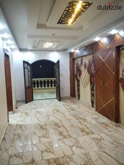 120 m apartment for annual rent modern family or groom super luxury finishing includes all services water and electricity and elevator 3 bedrooms reception two pieces kitchen bathroom on the eighth floor upper in Alexandria Al Agami kilo 21 on the beach of palms in a very distinguished location
