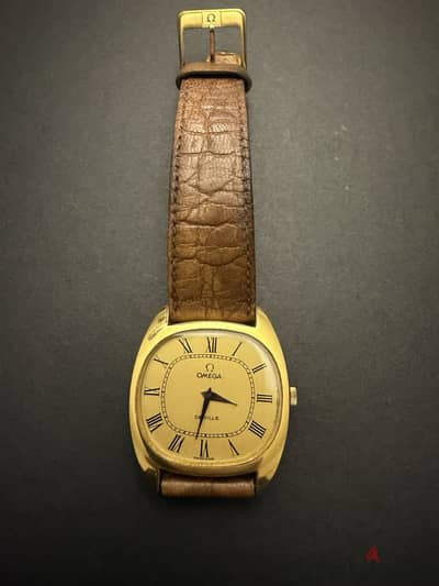 Omega gold watch