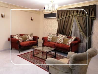 Fully furnished apartment for rent with an open view of landscapes and gardens, featuring modern furniture in Beverly Hills El Sheikh Zayed