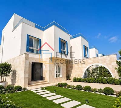 Fully finished townhouse lagoon view ready to move down payment 10 year interest free installments 255 sqm + 200 land roof Ras El Hekma near services