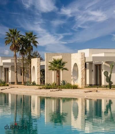 شاليه بجاردن بفيو مباشر على الاجون بجانب هاسيندا فى ذا ميد