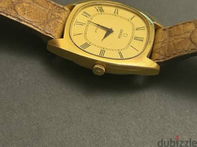 Omega gold watch