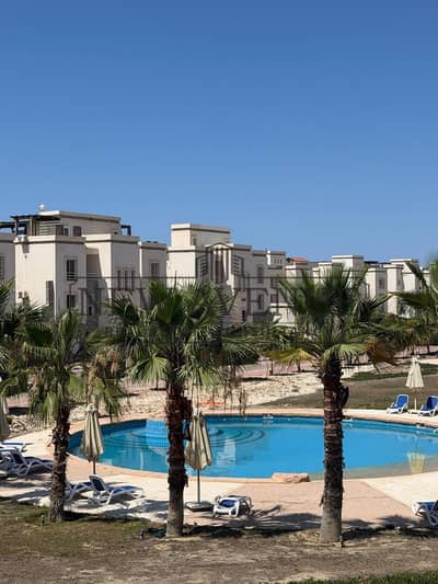 Chalet for sale in one of the best locations in Amwaj North Coast, featuring a premium swimming pool view, high-end finishing, and a great price!