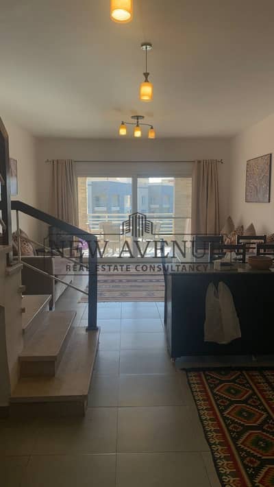 Roof duplex for sale in one of the best locations in Amwaj North Coast, featuring a premium swimming pool view, high-end finishing, and a great price!