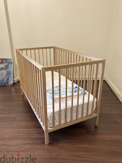 IKEA crib + original and extra mattress