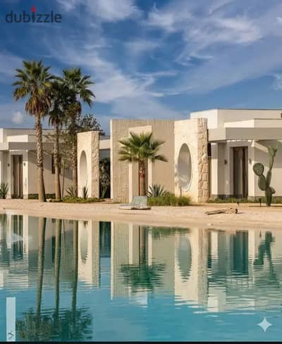 Own a chalet with luxurious finishes overlooking the lagoon in The Med Ras Al Hikma